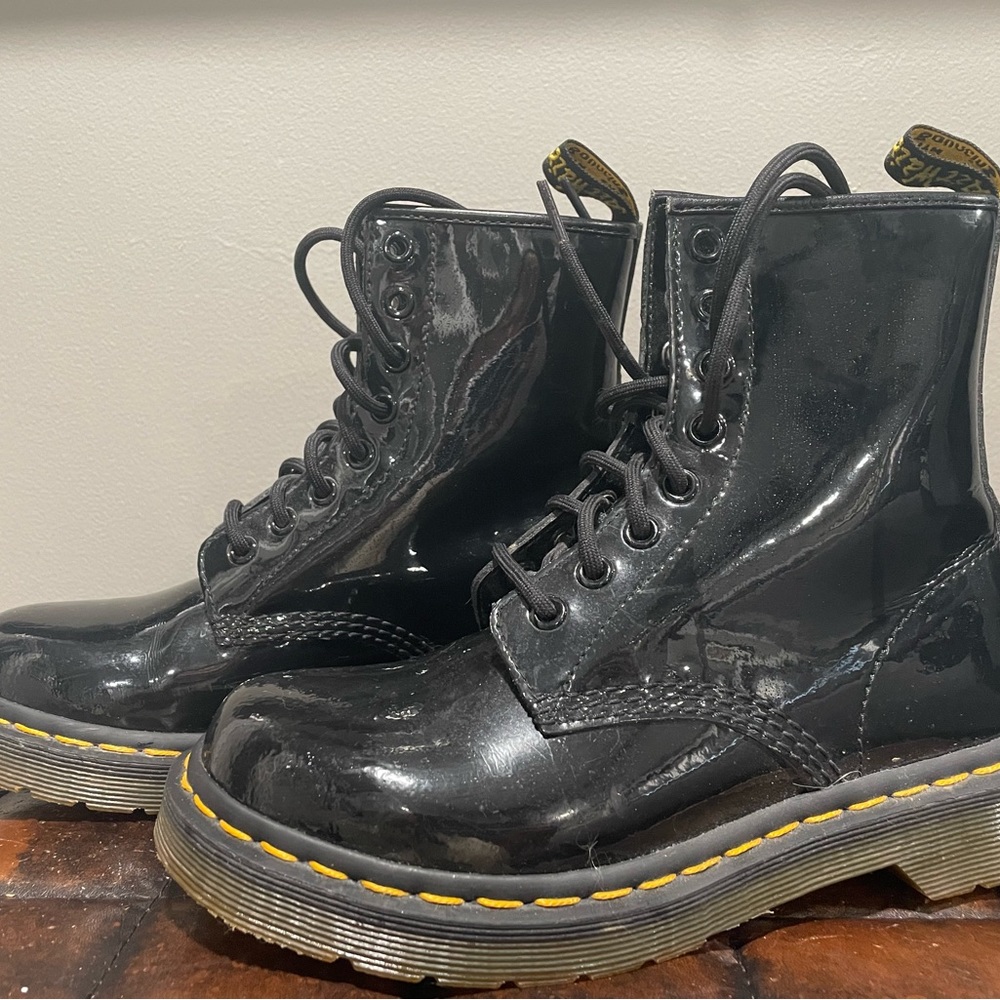 Women’s black patent leather boots. Extra shiny!